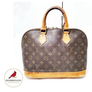 Louis Vuitton Alma Monogram Handbag